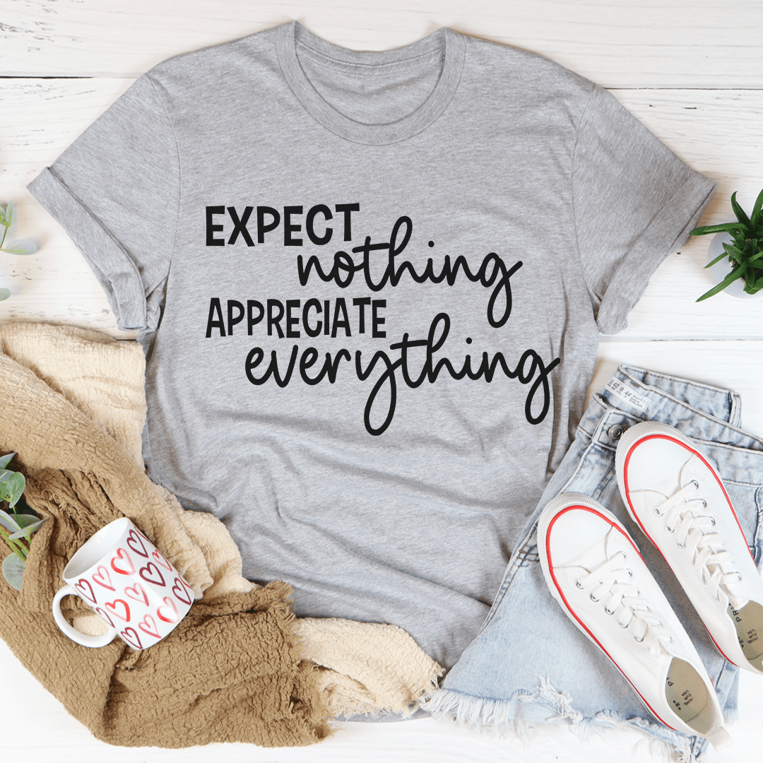 Gray T-shirt with 'Expect nothing' script and 'appreciate everything' text