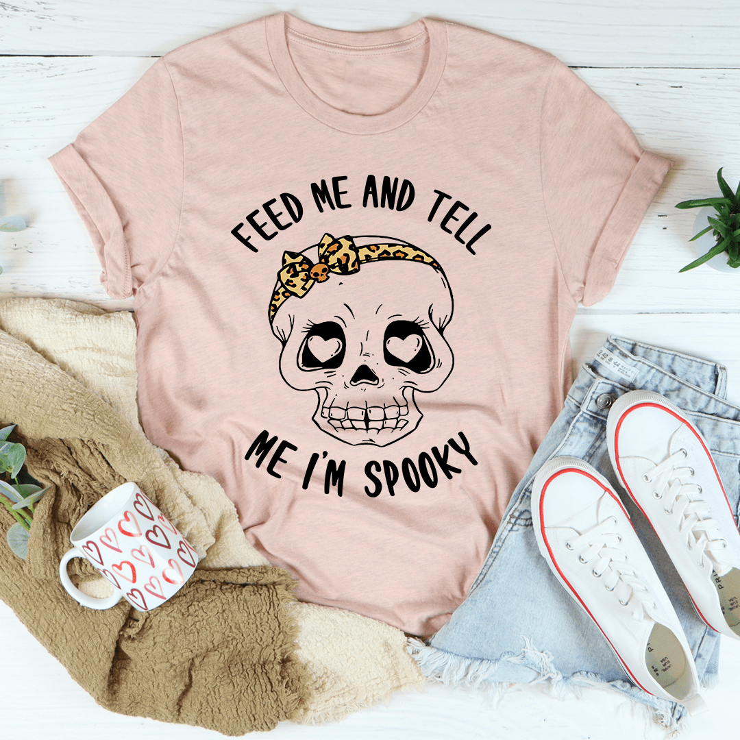 Pink graphic skull T-shirt with leopard headband and 'Feed me' text
