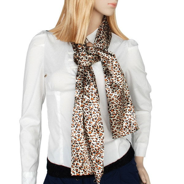 Leopard-print scarf wrap worn at the neck, soft natural silky fabric