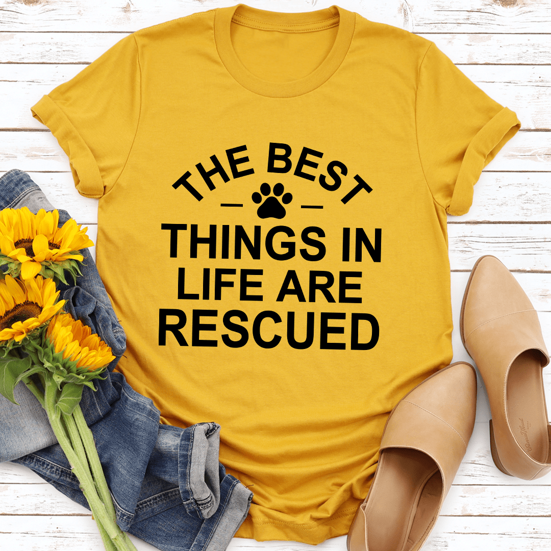 Mustard rescue T-shirt with bold black paw and stacked slogan text