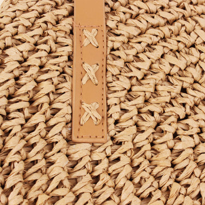 Sandy beige leather strap panel with starfish cutout accents on woven straw