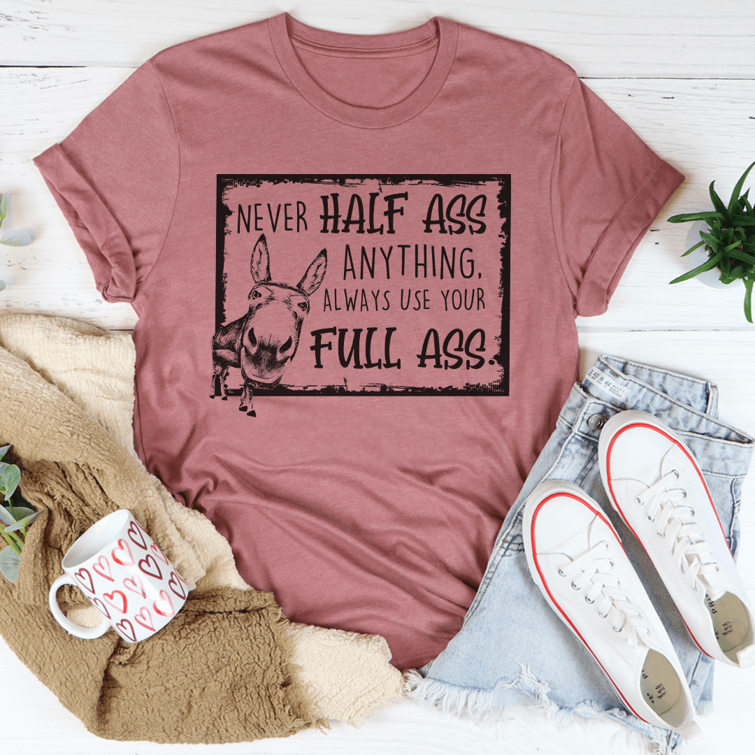 Pink crewneck T-shirt with front graphic print of a dog and slogan text.