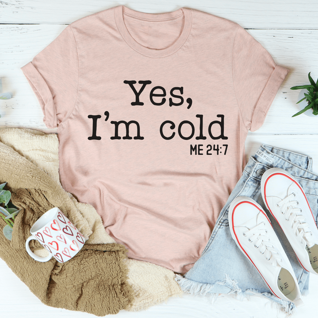 Light mauve T-shirt with 'Yes, I'm cold' graphic and 'ME 24:7' text