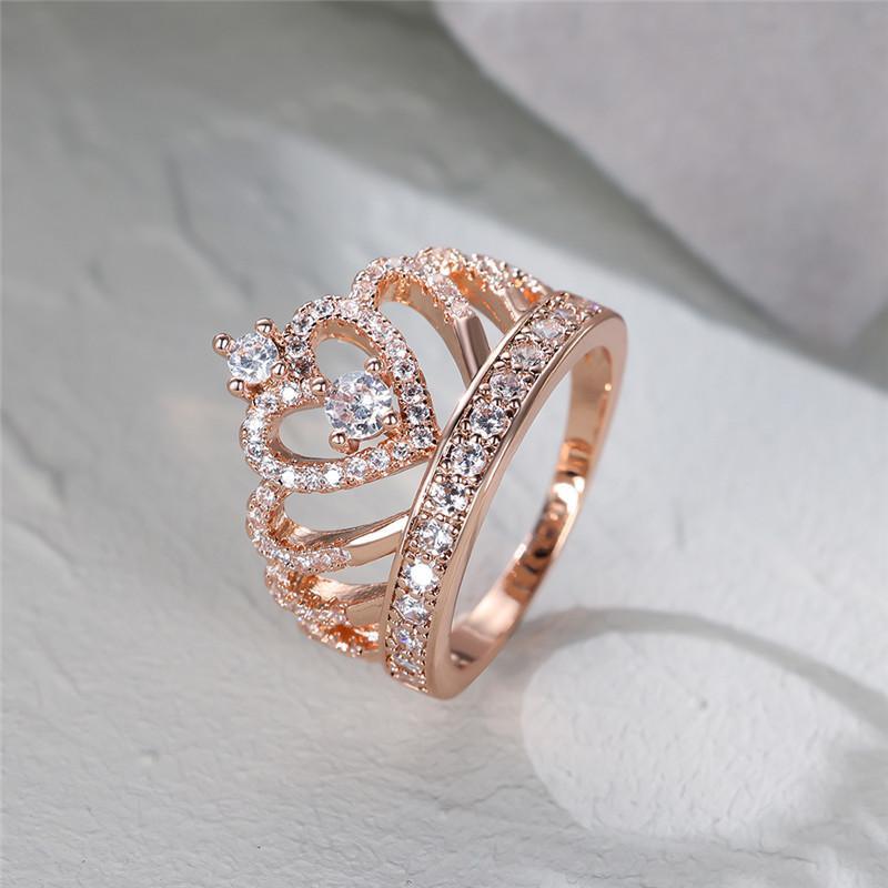Rose gold heart crown ring with pavé crystals and raised heart-shaped centerpiece