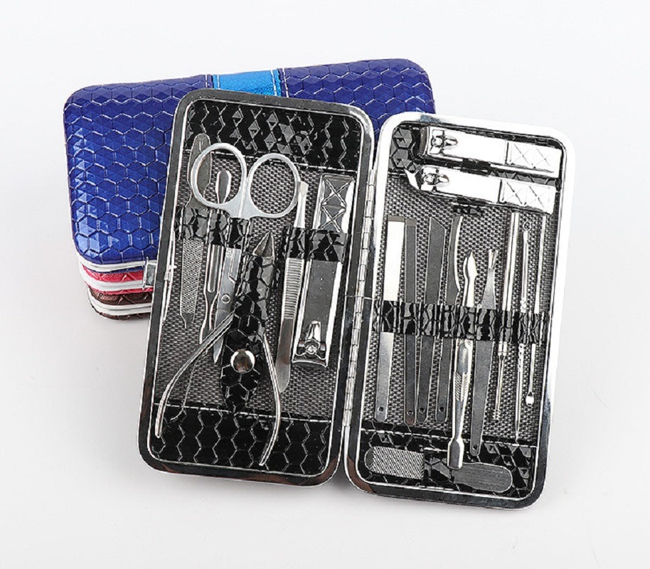 Nail clipper set travel grooming kit with blue hard case and stainless tools, opened