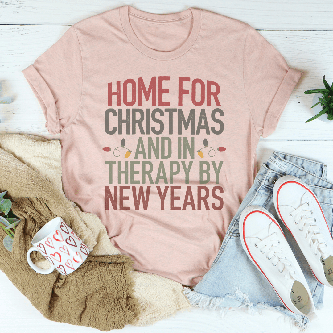 Peach pink crewneck graphic T-shirt with holiday slogan text