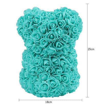 Teal rose teddy bear made of layered rosettes, shown from the front