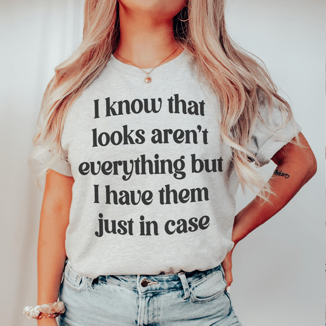 Light heather gray T-shirt with front quote: I know that looks aren't everything