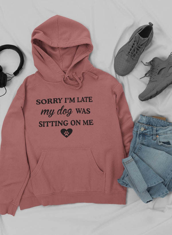 Mauve hoodie with kangaroo pocket, drawstring hood, and dog slogan graphic