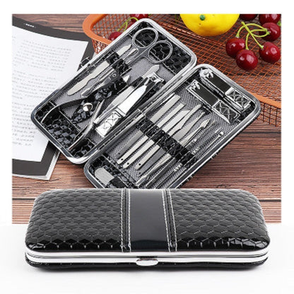 Nail grooming tool set in silver-and-black hard case, tools neatly arranged