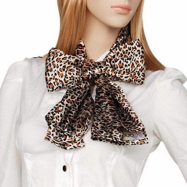 Leopard-print scarf wrap with tied bow detail, natural silky fabric