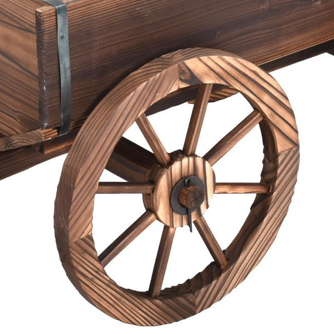 Wood wagon planter pot stand with wheels, close-up of large spoked wheel
