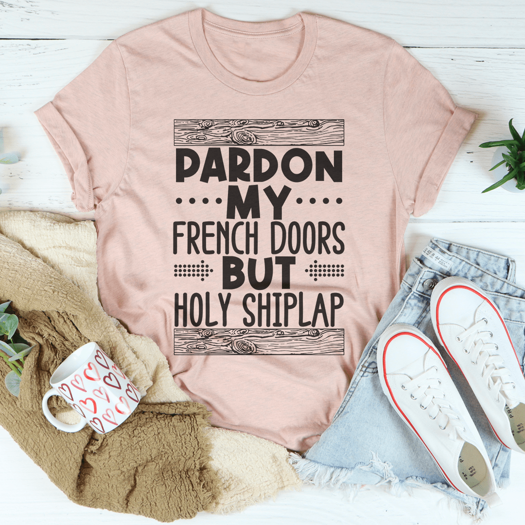 Light pink T-shirt with large 'PARDON' and 'HOLY SHIPLAP' graphic, crew neck