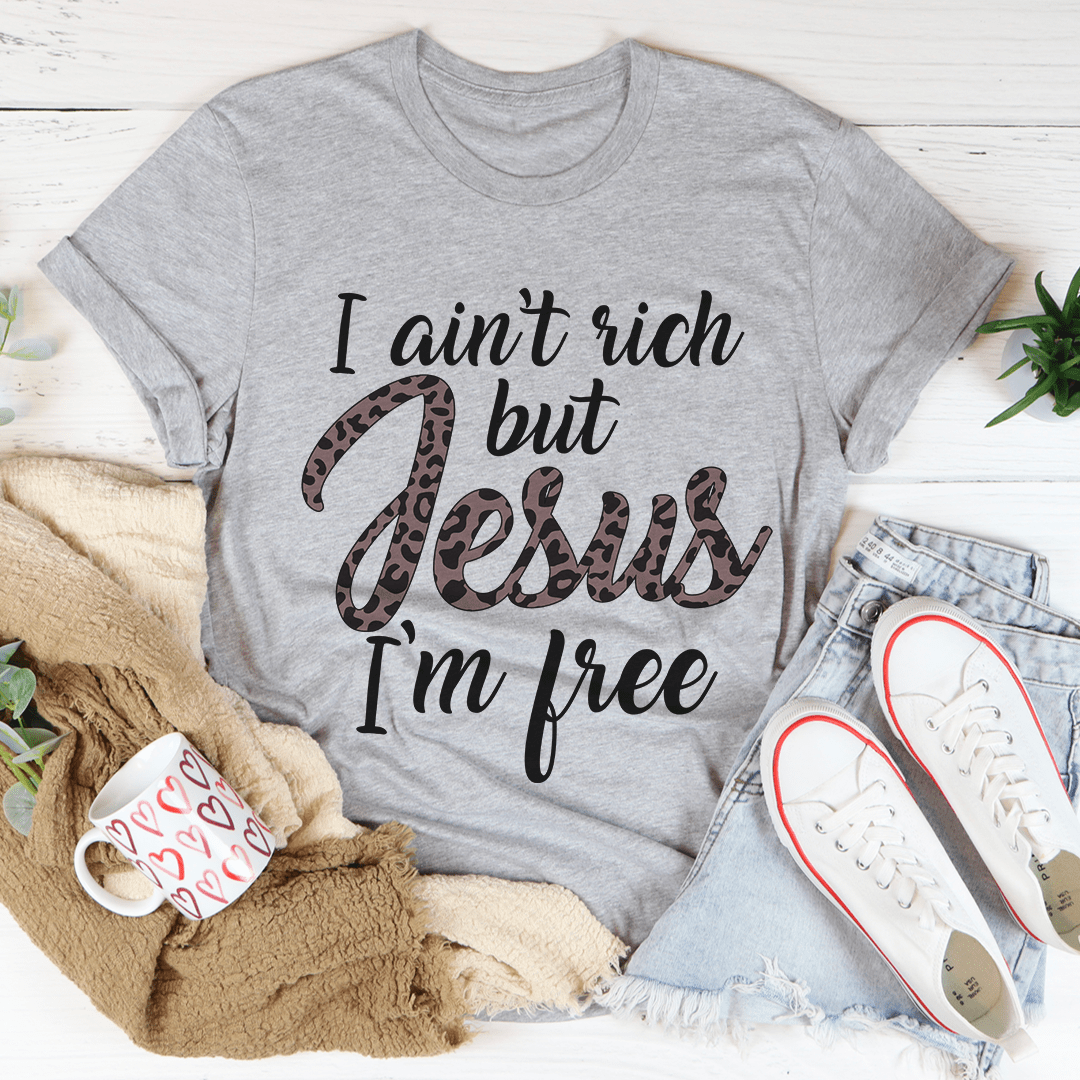 Gray graphic T-shirt: 'I ain't rich but Jesus I'm free' front print