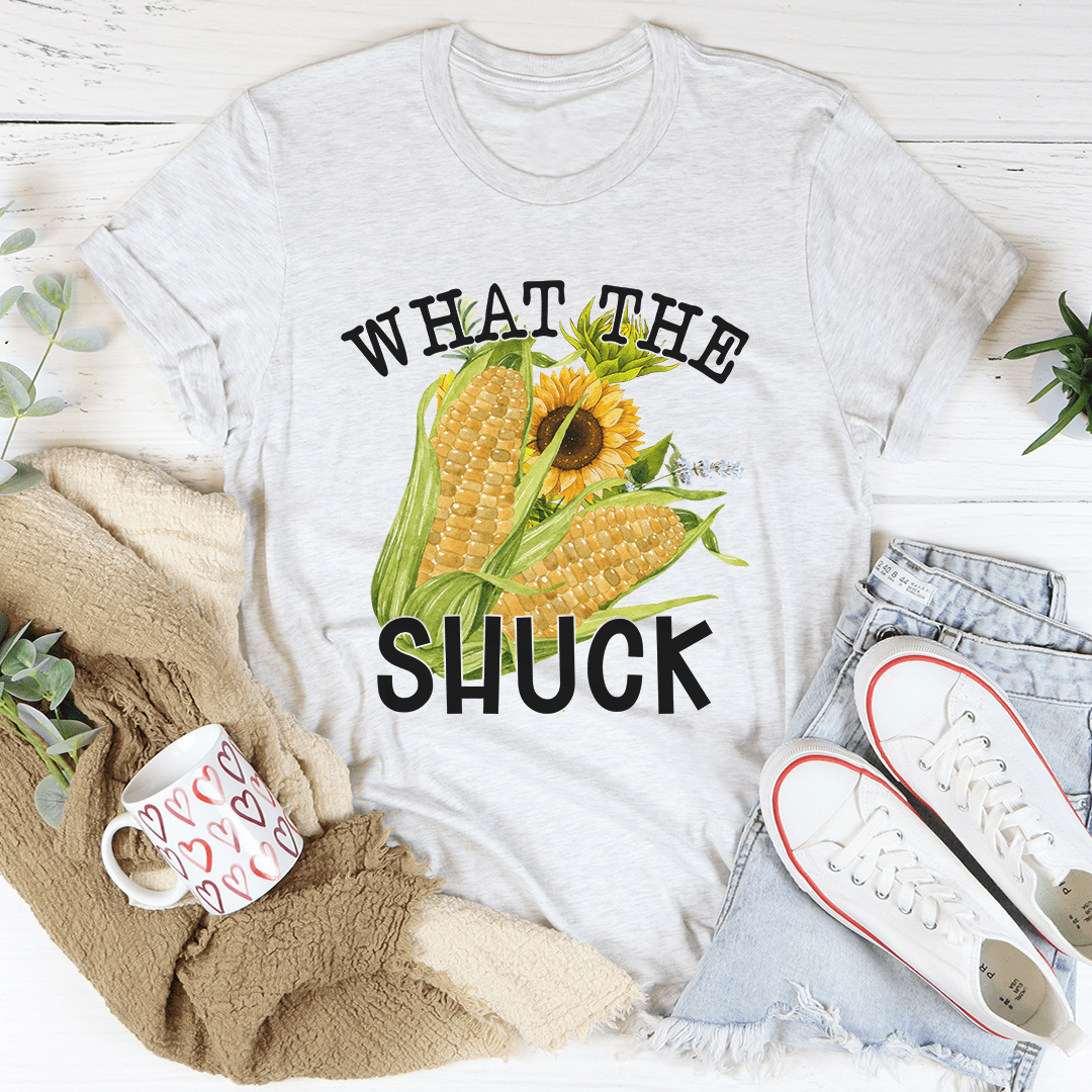 Light gray T-shirt with “WHAT THE SHUCK” corn and sunflower front print