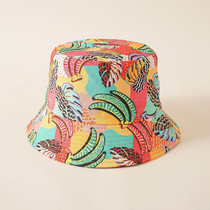 Jungle themed bucket hat with elephants, zebras, and striped rainbow shapes