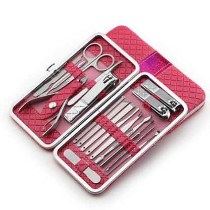 Nail clipper set travel kit with pink hard case and stainless tools, opened