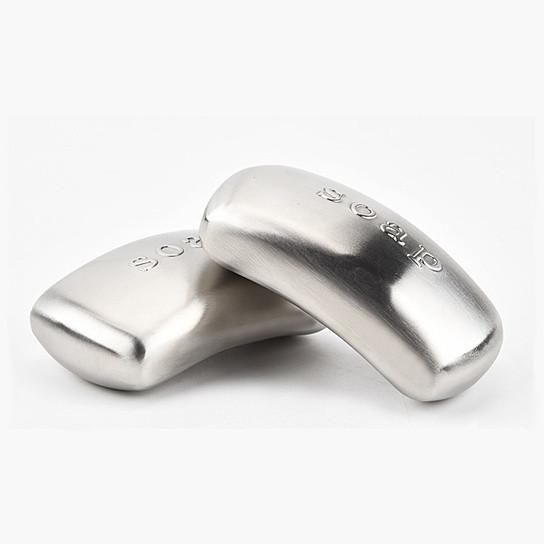 Stainless steel odor remover bar, curved rectangular shape with embossed text