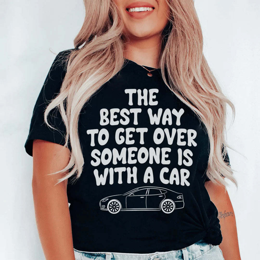 Black T-shirt with bold slogan and car graphic on front