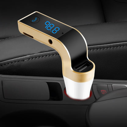 Gold car FM transmitter plugged in car socket, with LCD frequency display