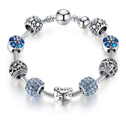 Blue flower charm bracelet with silver-tone beads and heart Love charm.