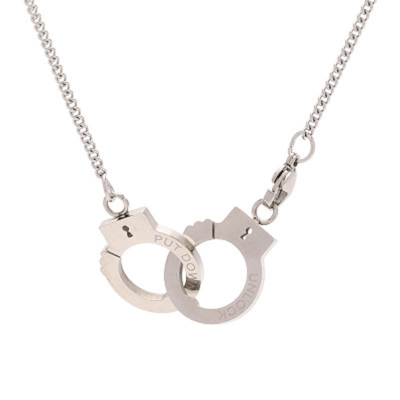 Stainless steel handcuff pendant necklace with linked handcuff charm and chain