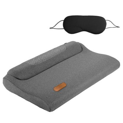 Dark grey neck massager pillow with curved design and black controller pad