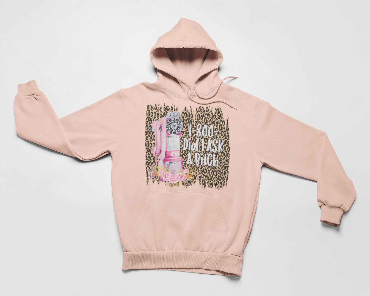 Peach pullover hoodie with hood, kangaroo pocket, and front graphic print