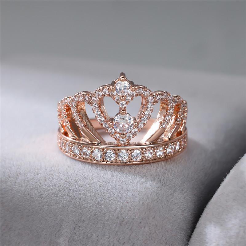Crown-style heart promise ring with clear stones on rose-gold tone band