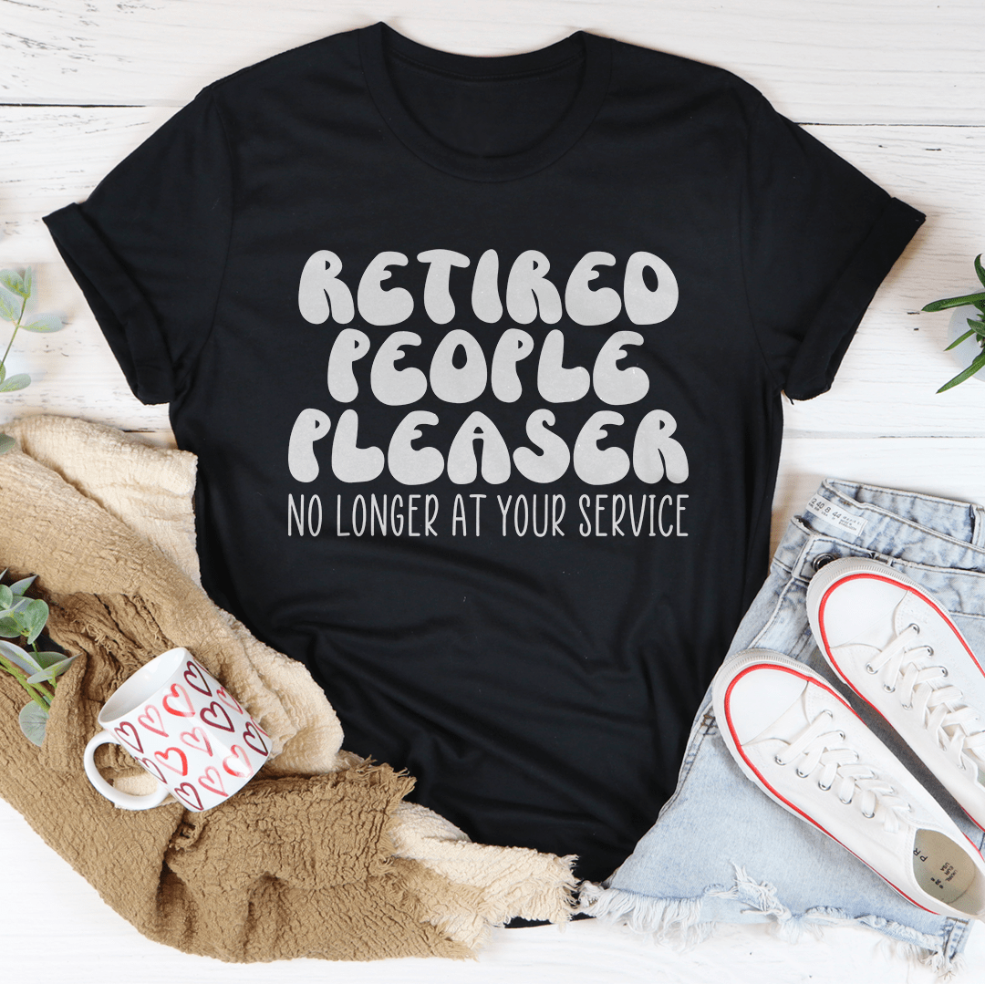 Black crewneck t-shirt with "Retired People Pleaser" and "No longer at your service" text