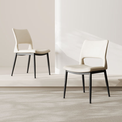 Modern minimalist black PU leather Dining Chairs Set of 2, comfortable backrest design, metal leg support, suitable for restaurants, kitchens, and offices.