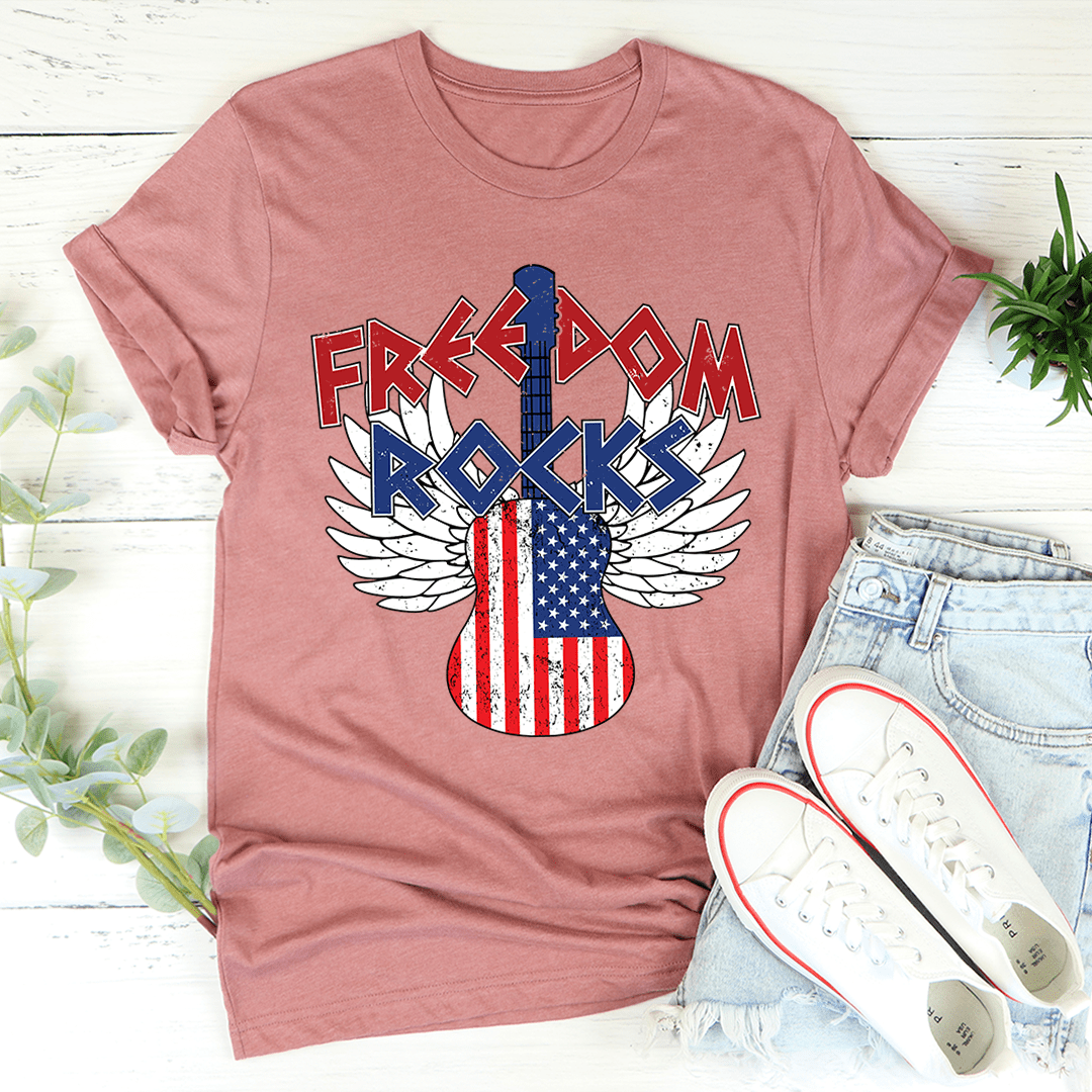 Freedom Rocks T-shirt in mauve with winged patriotic guitar graphic