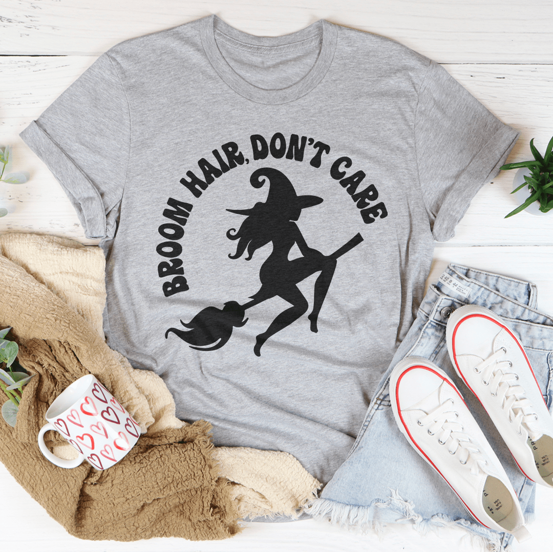 Heather gray graphic T-shirt with witch silhouette and curved slogan text