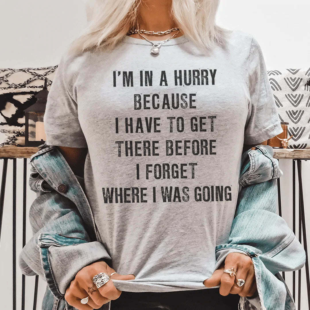 Heather gray crewneck graphic T-shirt with black 'I'm in a hurry' slogan front
