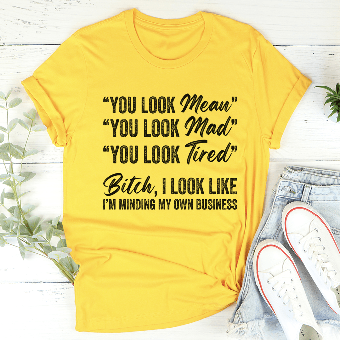 Mustard yellow t-shirt with black quote slogan print on front, crew neck short sleeves