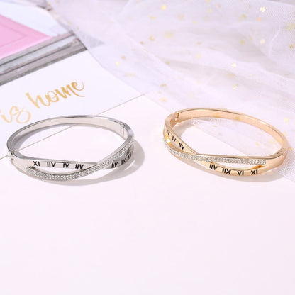 Roman numeral bracelet bangles, silver and gold tones with rhinestone accents