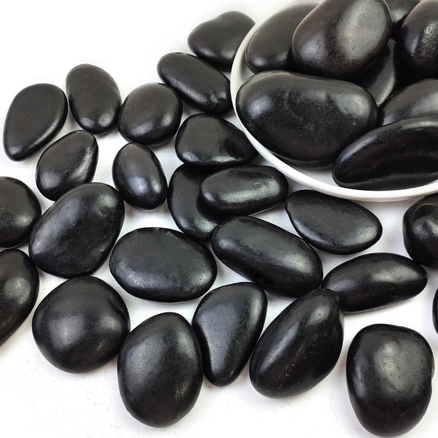 Polished black river rocks, smooth oval stones for planters and aquariums