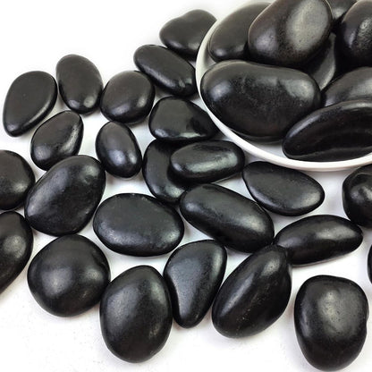 Polished black river rocks, smooth oval stones for planters and aquariums