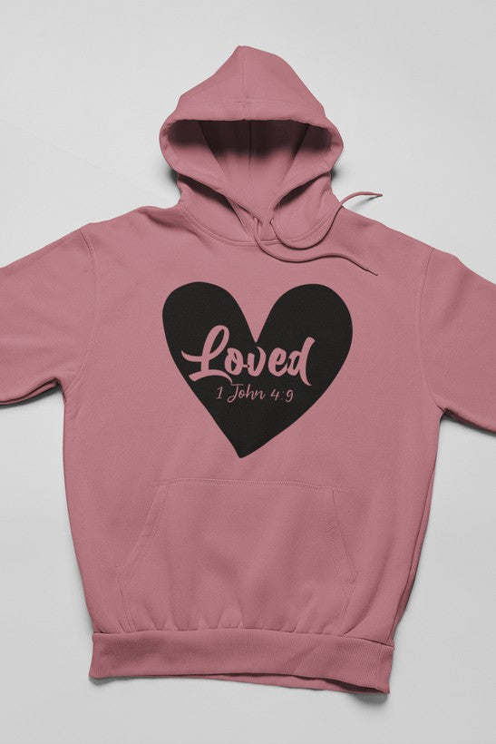 Rose pink hoodie with “Loved” heart graphic and “1 John 4:9” text on chest