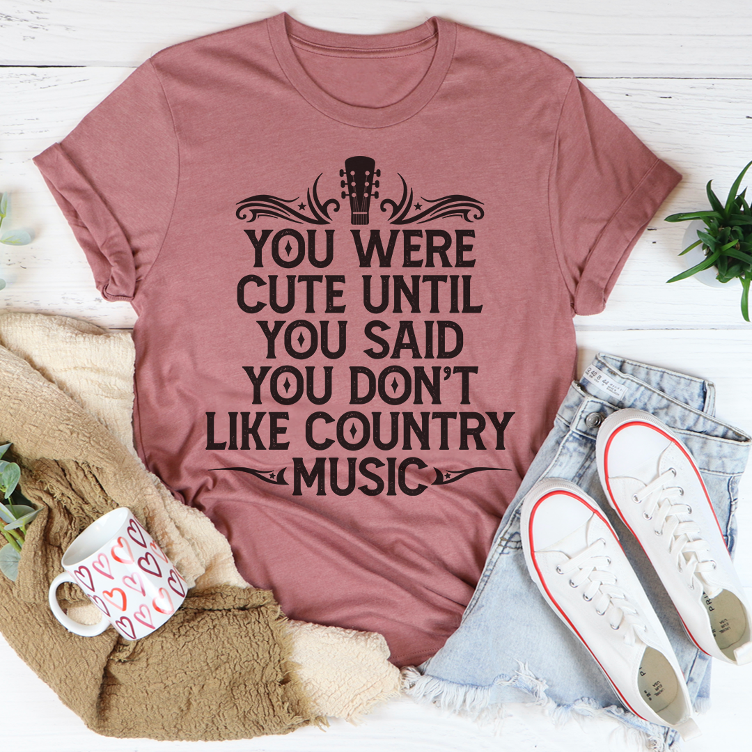 Mauve short-sleeve T-shirt with bold front country music text graphic
