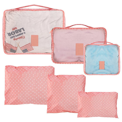 Pink water-resistant packing cubes set with mesh window and red zipper trim
