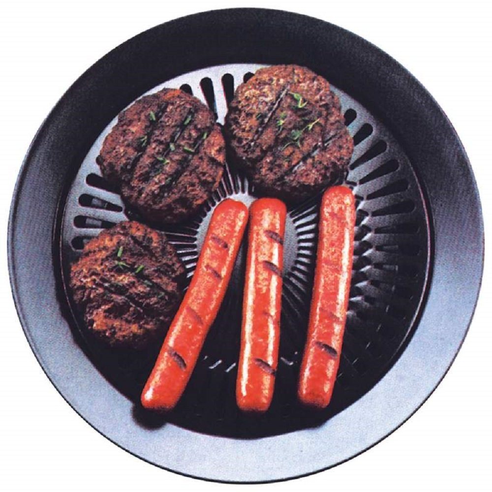 Round smokeless grill with grilled patties, hot dogs, and herbs on black grates