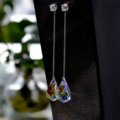 Long silver teardrop crystal dangle earrings with rainbow blue faceted drops