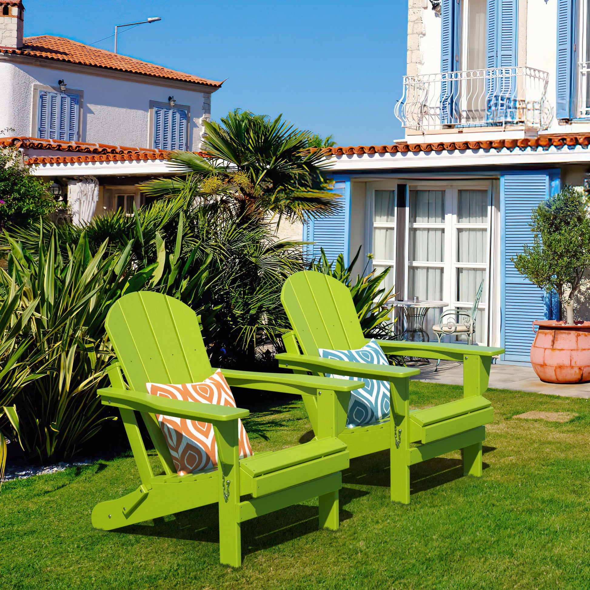 Set of two lime green folding adirondack chairs with slatted seats and curved backs