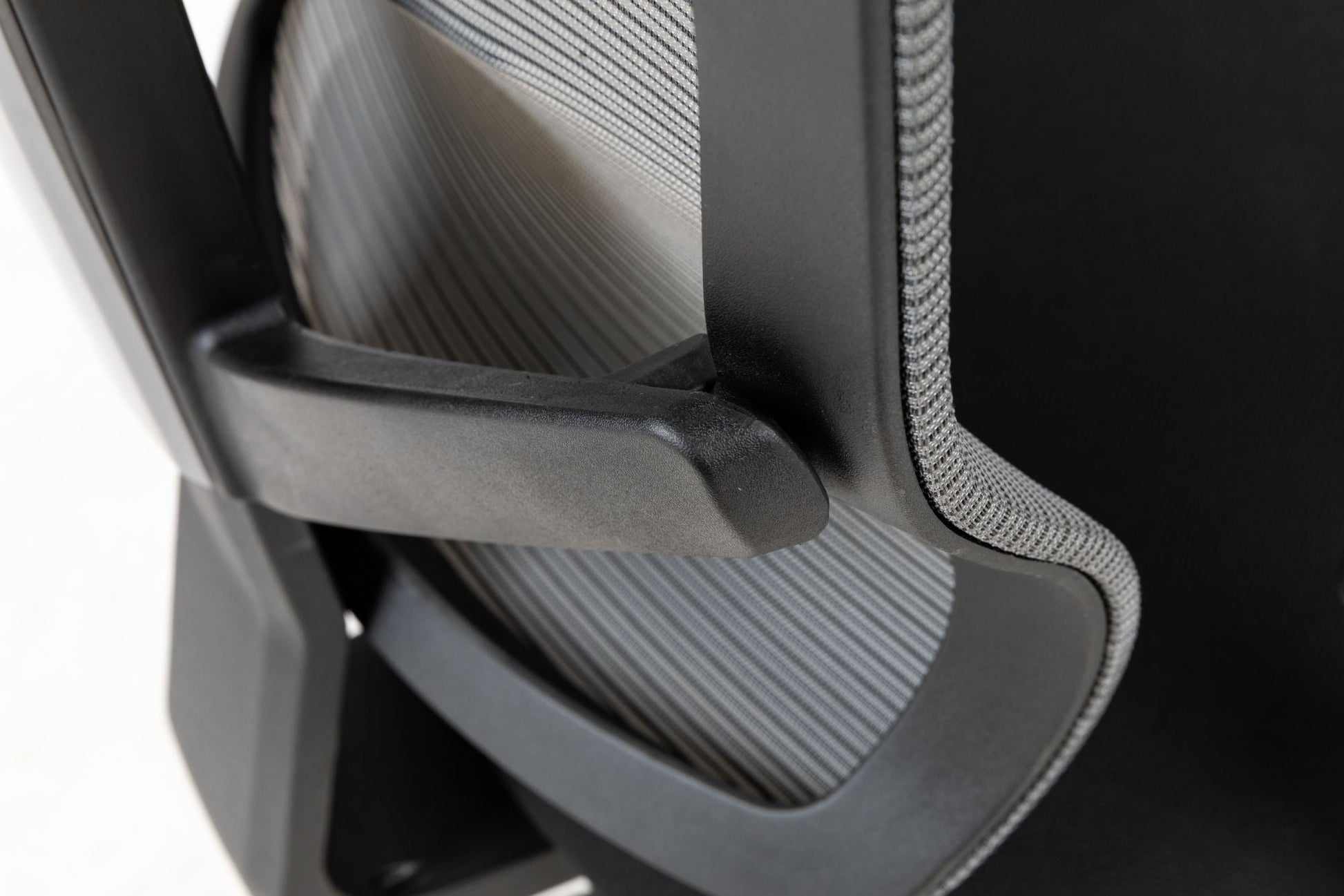 Office chair armrest and lower back support with curved padded panel