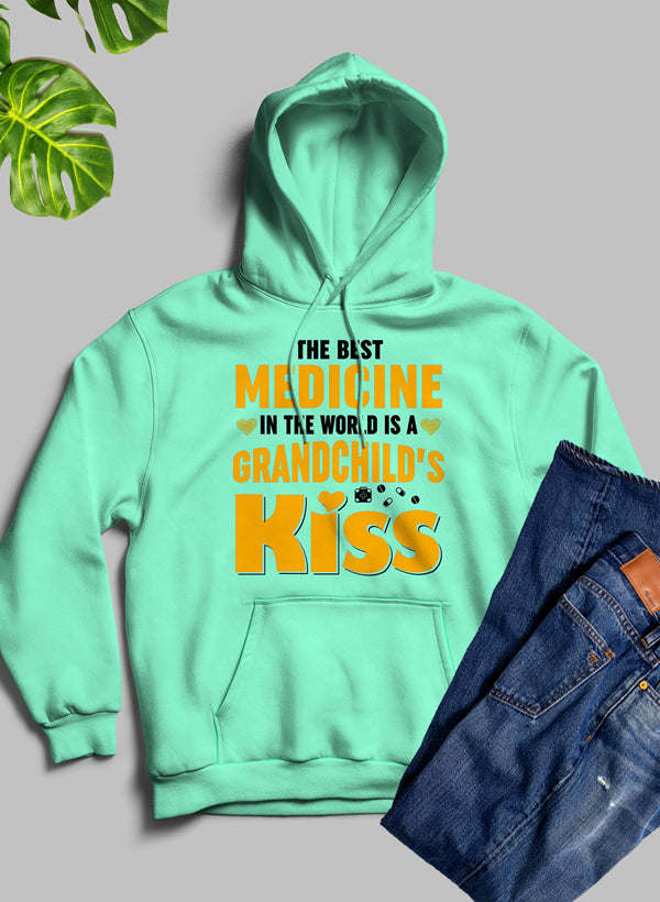 Heather prism mint hoodie with front kangaroo pocket and “Grandchild’s Kiss” graphic