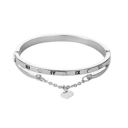 Silver-tone bangle bracelet with roman numerals, tiny diamond accents, heart charm