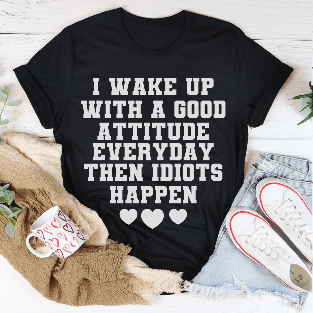 Black T-shirt with large white slogan text "I wake up" and three heart icons