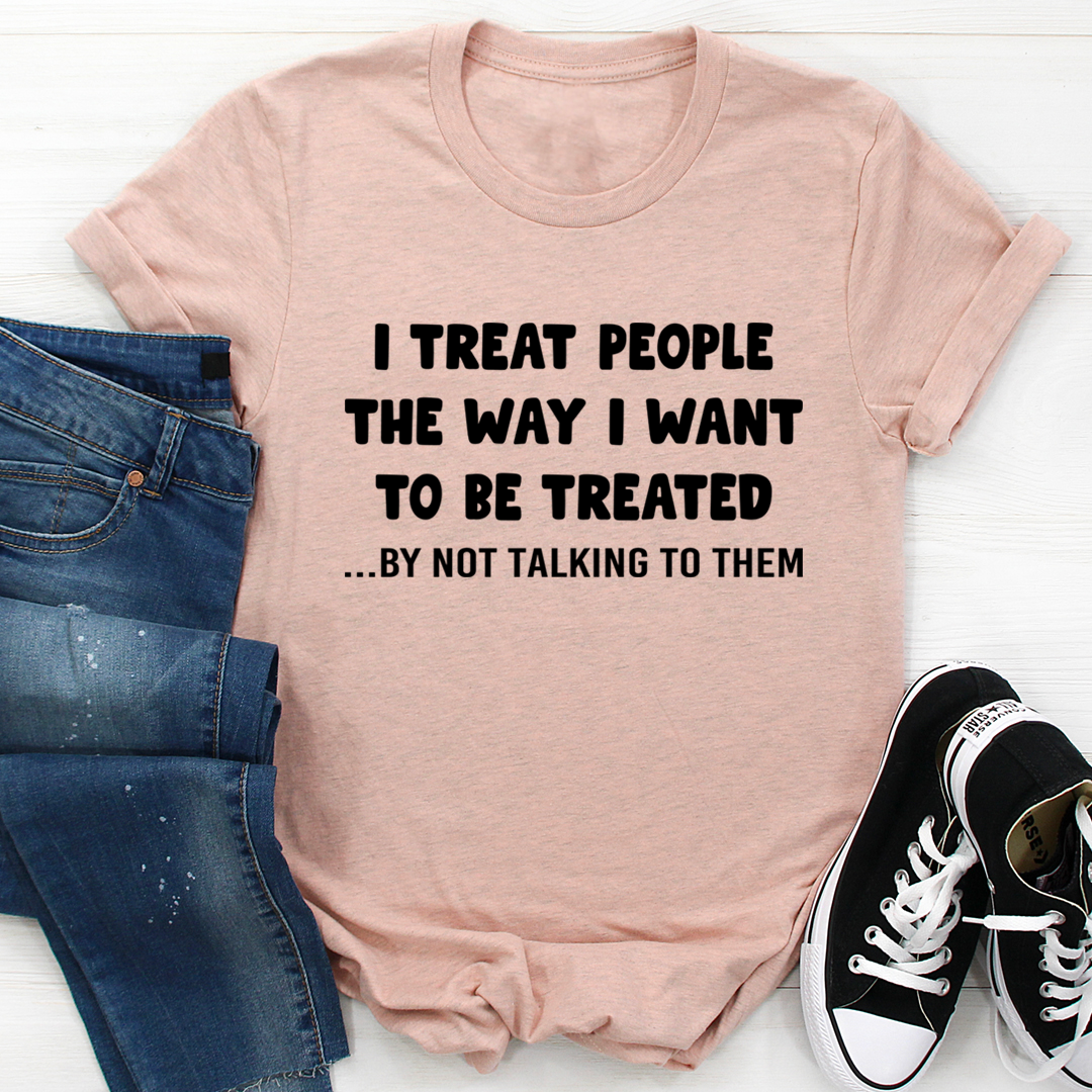 Light pink T-shirt with bold black slogan: I TREAT PEOPLE THE WAY I WANT