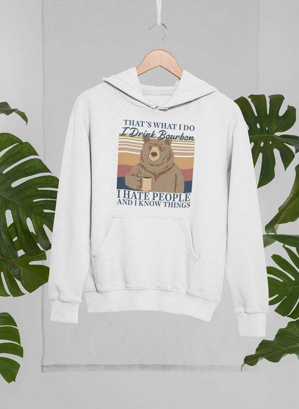White pullover hoodie with bear graphic and front kangaroo pocket, drawstring hood